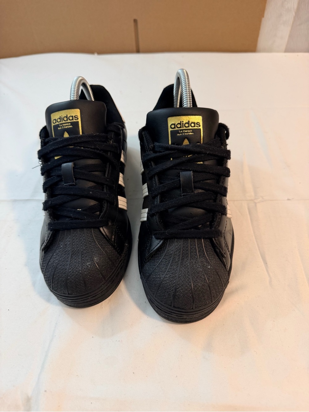 adidas Kids Black Sneakers with White Stripes and Gold Logo